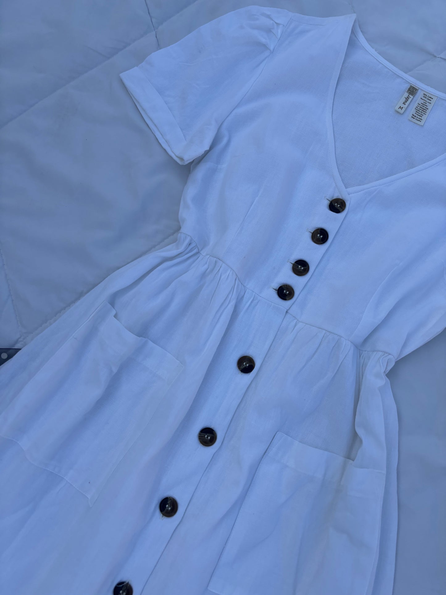 White buttoned dress