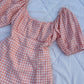 Peach gingham dress