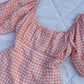 Peach gingham dress