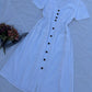White buttoned dress