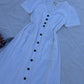 White buttoned dress